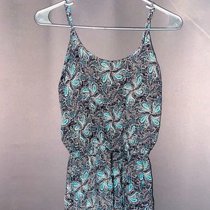 A summer/ spring romper from Raya Sun. Worn. Size small.